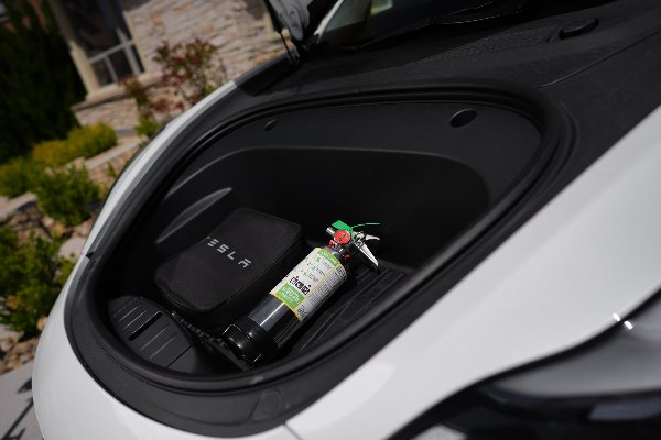 lithium battery fire extinguisher in trunk of tesla
